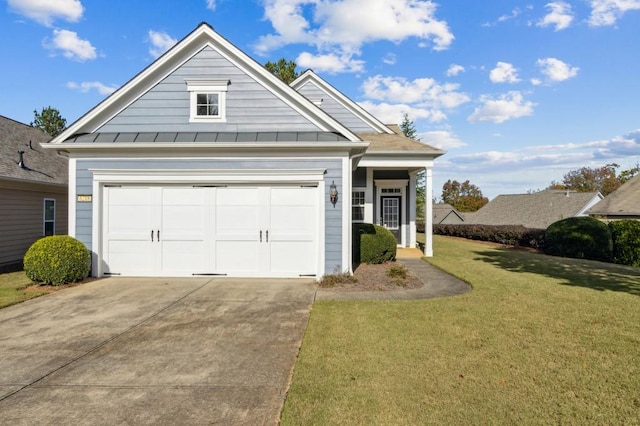 view of front facade featuring a standing seam roof, concrete driveway, metal roof, and a front lawn