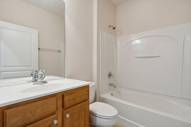 full bath with toilet, shower / bathing tub combination, and vanity