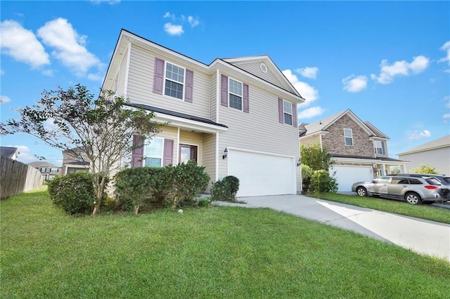 view of front of house featuring a garage and a front yard