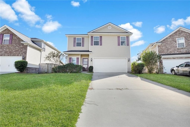 front of property featuring a front lawn and a garage