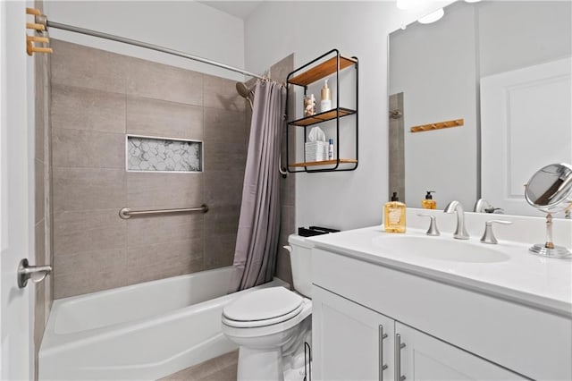 full bath featuring toilet, shower / bath combo with shower curtain, and vanity