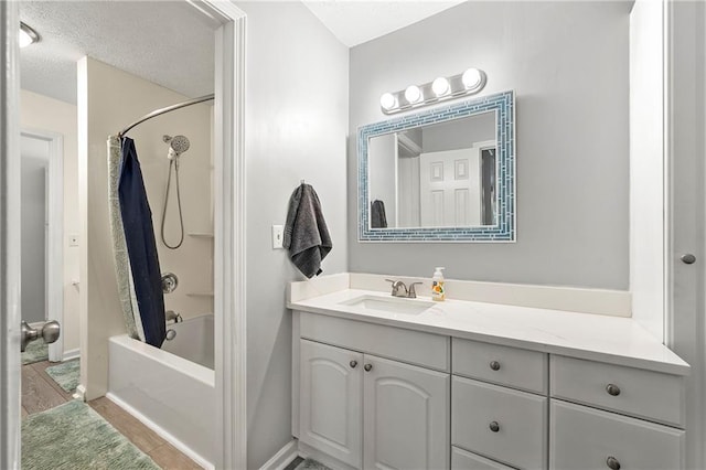 4131 N Gloucester Pl, Atlanta, GA 30341 - full bath featuring vanity, shower / bath combo with shower curtain, a textured ceiling, and baseboards