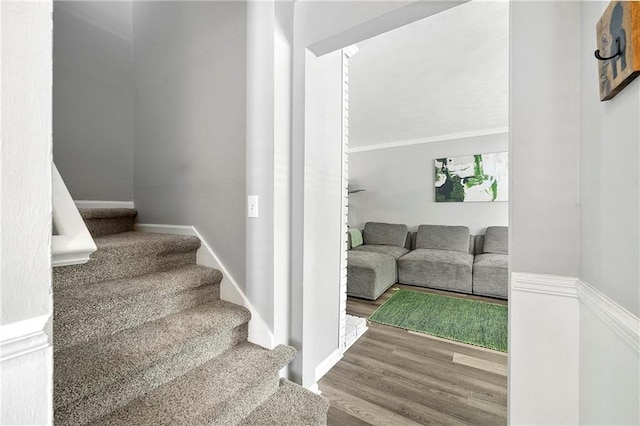 4131 N Gloucester Pl, Atlanta, GA 30341 - stairway with wood finished floors and crown molding