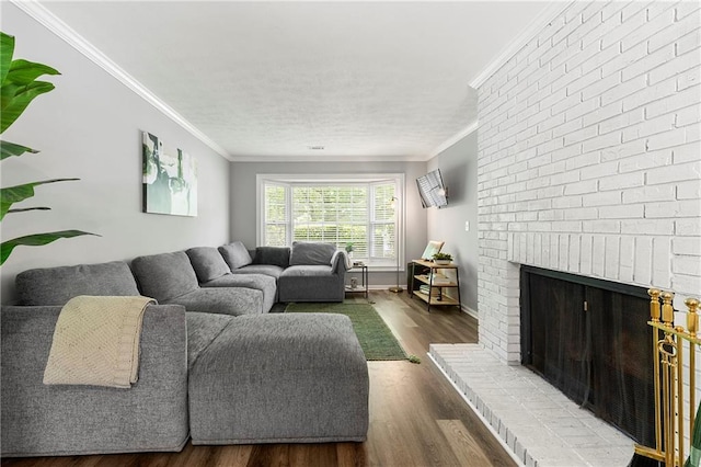 4131 N Gloucester Pl, Atlanta, GA 30341 - living room featuring ornamental molding, wood finished floors, a brick fireplace, and baseboards