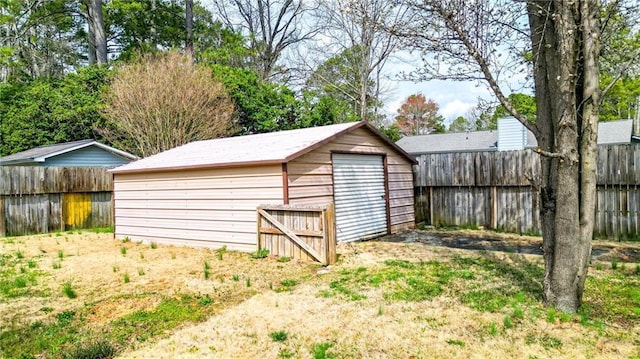 view of shed featuring a fenced backyard