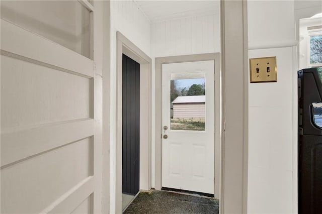 entryway featuring washer / dryer