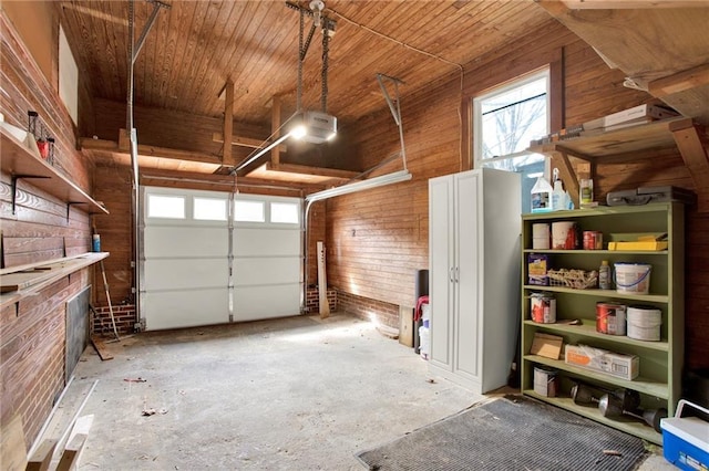 garage with wooden walls, wood ceiling, and a garage door opener