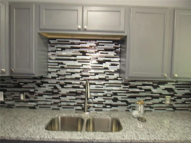 3086 Lone Oak Ave SW, Atlanta, GA 30354 - kitchen featuring tasteful backsplash and a sink
