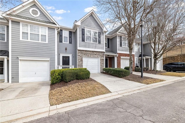 multi unit property featuring a garage