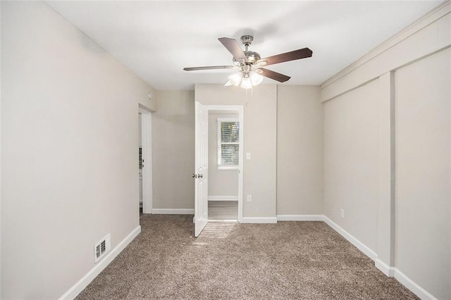 unfurnished bedroom with carpet flooring and ceiling fan