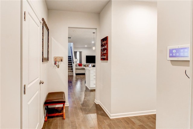 hall featuring wood-type flooring