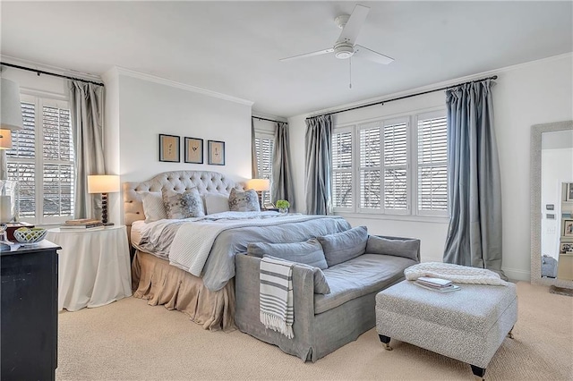 bedroom featuring multiple windows, ornamental molding, and carpet