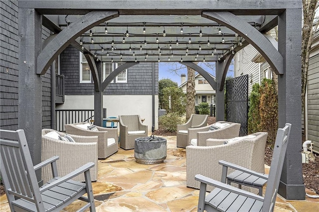 view of patio / terrace featuring a pergola and an outdoor hangout area