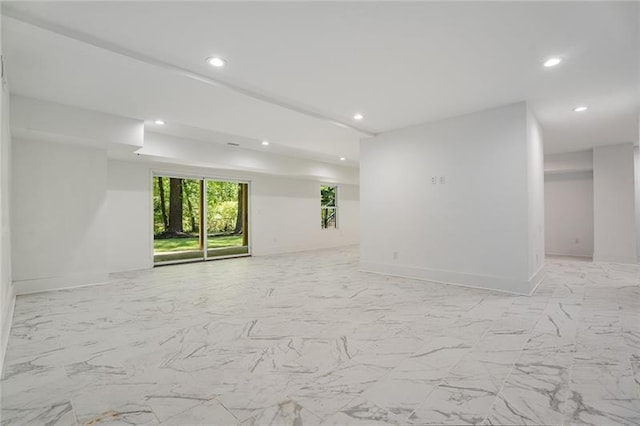 empty room with light tile patterned floors