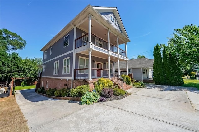 3416 Harrison Rd, Atlanta, GA 30344 - greek revival house featuring a balcony and covered porch