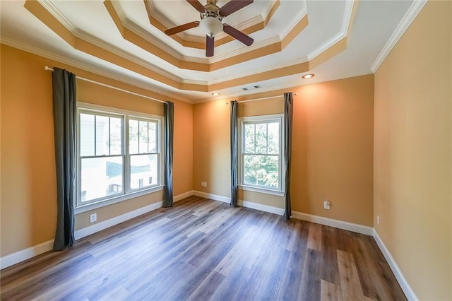 3416 Harrison Rd, Atlanta, GA 30344 - spare room with crown molding, a tray ceiling, a ceiling fan, wood finished floors, and baseboards
