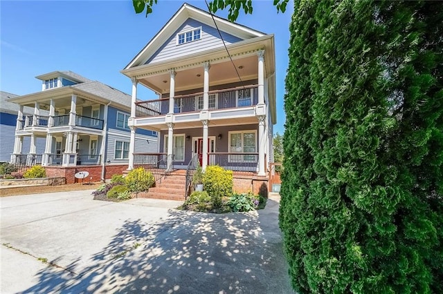 3416 Harrison Rd, Atlanta, GA 30344 - view of front facade with a porch and a balcony