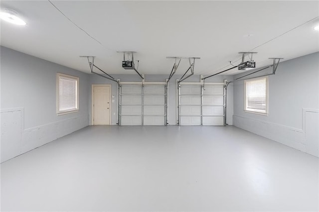 3416 Harrison Rd, Atlanta, GA 30344 - garage featuring a garage door opener