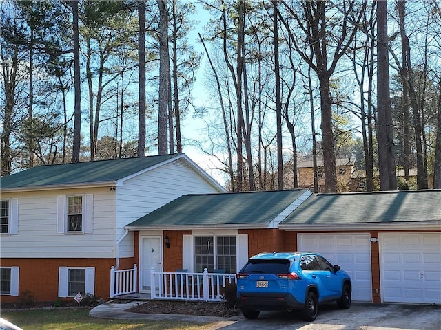 view of front of home featuring a garage