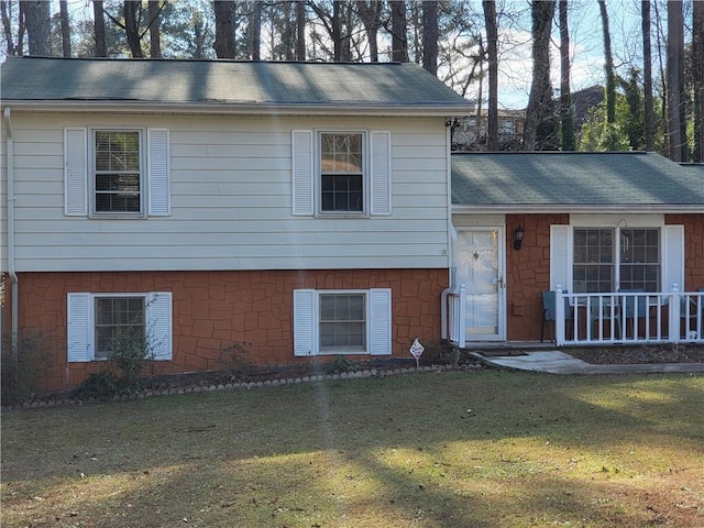 view of front of home with a front yard