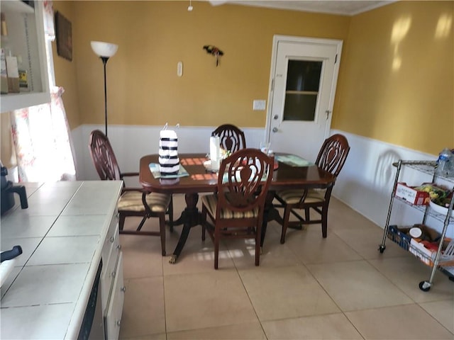 dining area with light tile patterned flooring