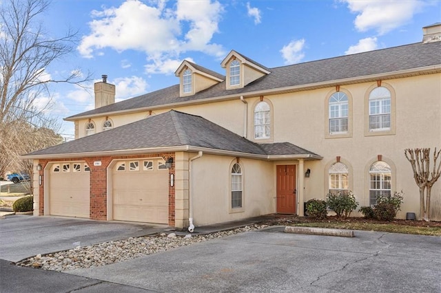 view of front of property with a garage