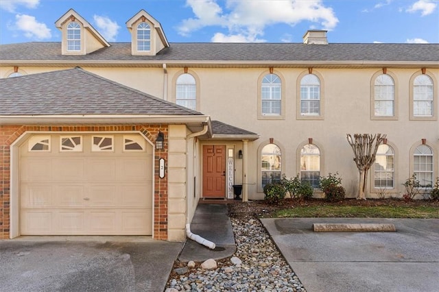 view of front of home featuring a garage