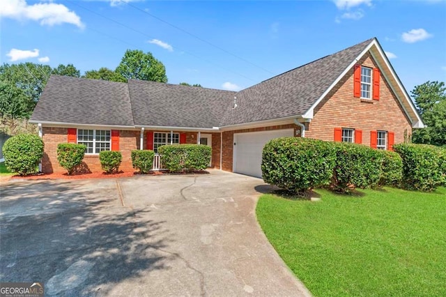 view of front of property featuring a garage, brick siding, a shingled roof, and driveway