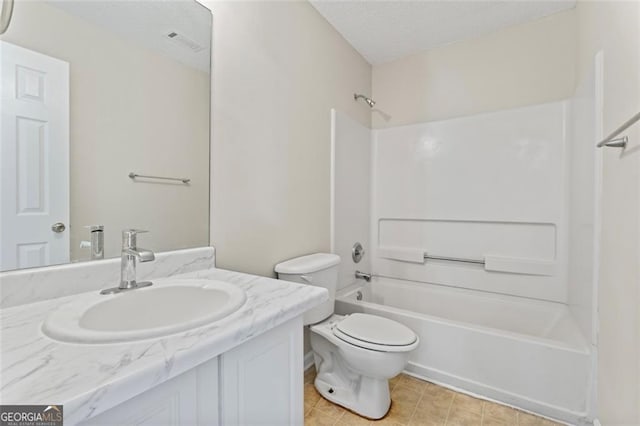 full bathroom with toilet, shower / washtub combination, visible vents, and vanity