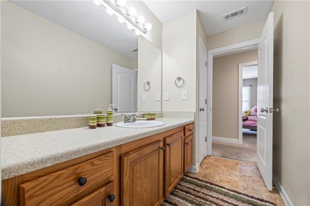 bathroom featuring vanity