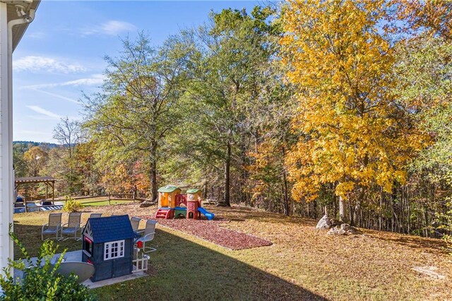 view of yard featuring a playground