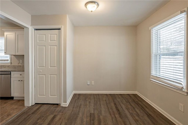 interior space with dark hardwood / wood-style flooring