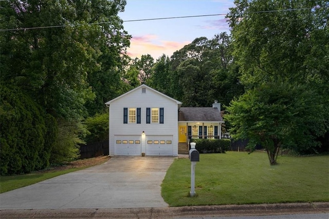 4255 Hidden Meadow Cir, Sugar Hill, GA 30518 - tri-level home with concrete driveway and an attached garage
