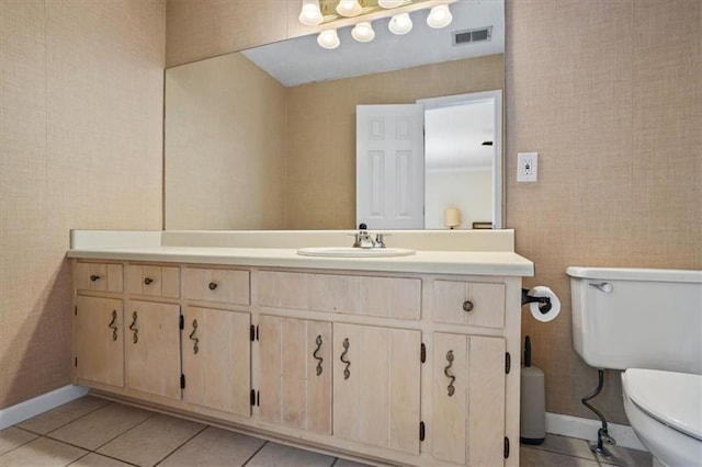 4255 Hidden Meadow Cir, Sugar Hill, GA 30518 - bathroom featuring toilet, vanity, baseboards, and tile patterned flooring