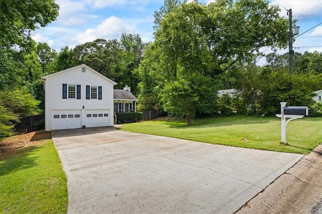 4255 Hidden Meadow Cir, Sugar Hill, GA 30518 - view of front of house featuring a garage, driveway, and view of scattered trees