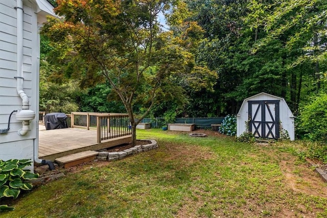 4255 Hidden Meadow Cir, Sugar Hill, GA 30518 - view of grassy yard featuring a wooden deck and a garden