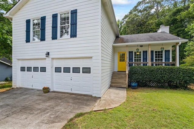 4255 Hidden Meadow Cir, Sugar Hill, GA 30518 - split level home featuring an attached garage, a front yard, driveway, a chimney, and a porch