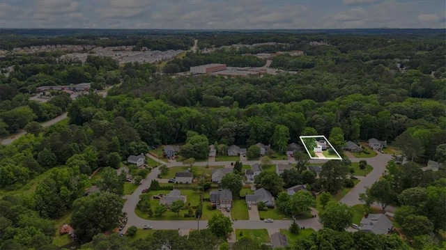 4255 Hidden Meadow Cir, Sugar Hill, GA 30518 - aerial view of property's location with property parcel outlined and a forest