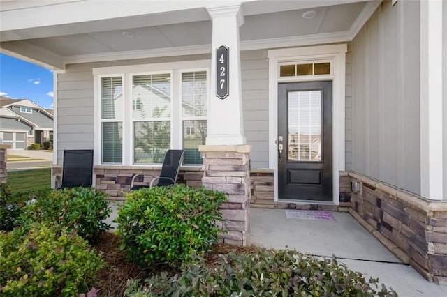 property entrance featuring covered porch