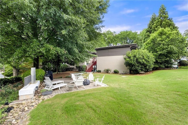 1355 Euclid Ave NE Unit A8, Atlanta, GA 30307 - view of green lawn with stairs and a patio area