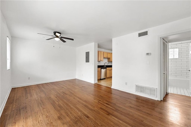 1355 Euclid Ave NE Unit A8, Atlanta, GA 30307 - unfurnished living room with ceiling fan, wood finished floors, and electric panel