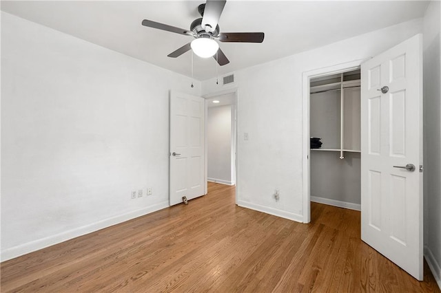 1355 Euclid Ave NE Unit A8, Atlanta, GA 30307 - unfurnished bedroom featuring a closet, wood finished floors, and ceiling fan