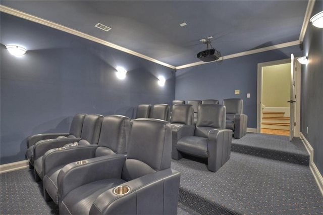 home theater with crown molding and carpet floors