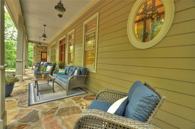 view of patio featuring a porch