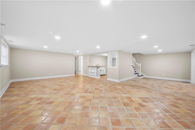 basement featuring light tile patterned flooring