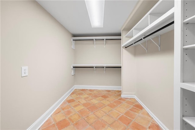 walk in closet featuring tile patterned floors