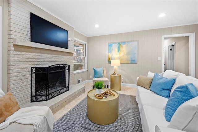 tiled living room featuring a fireplace