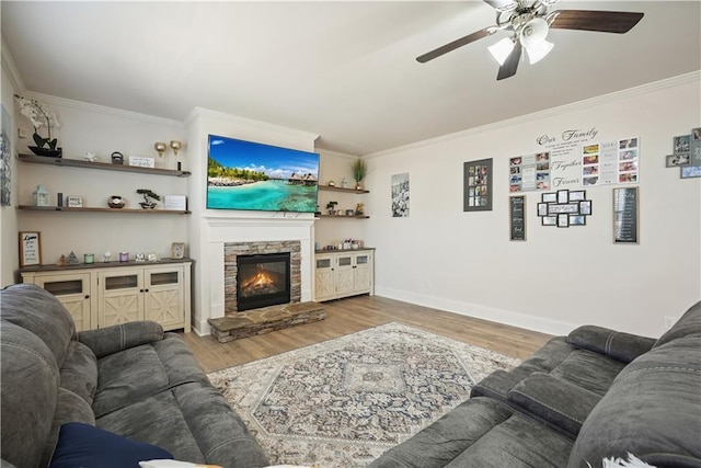 living room with wood finished floors and ornamental molding