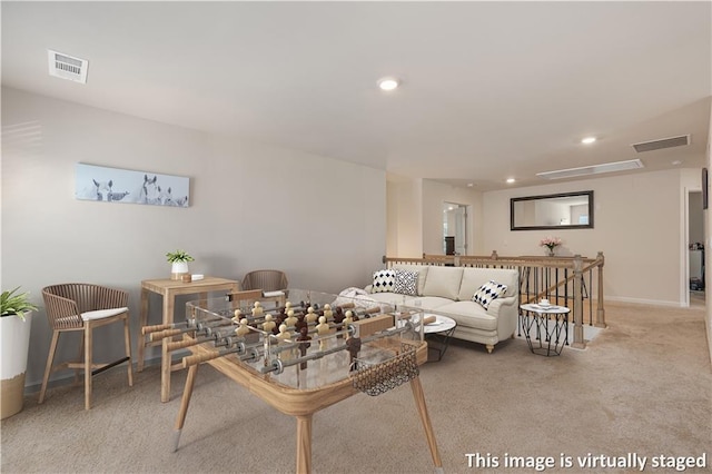 living room featuring recessed lighting, visible vents, and carpet flooring