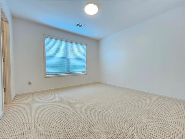 empty room with light carpet